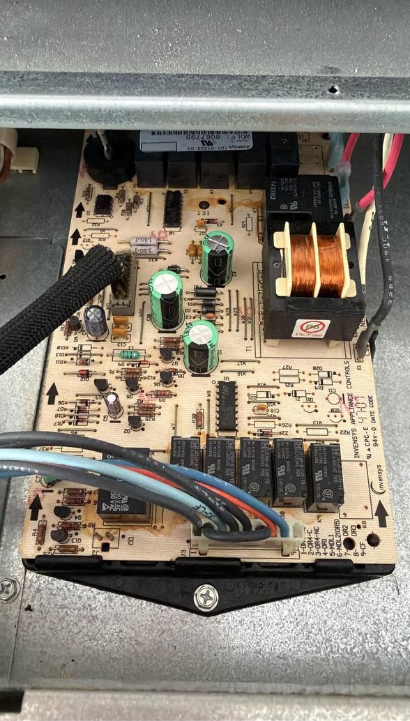 Appliance control board with capacitors and relays – expert electronic repair by NYC Sub-Zero & Viking Appliance Repair