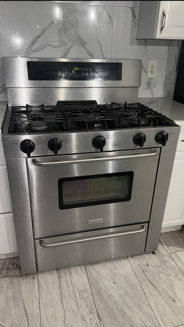 Stainless steel gas range with five burners – Viking range repair service in NYC